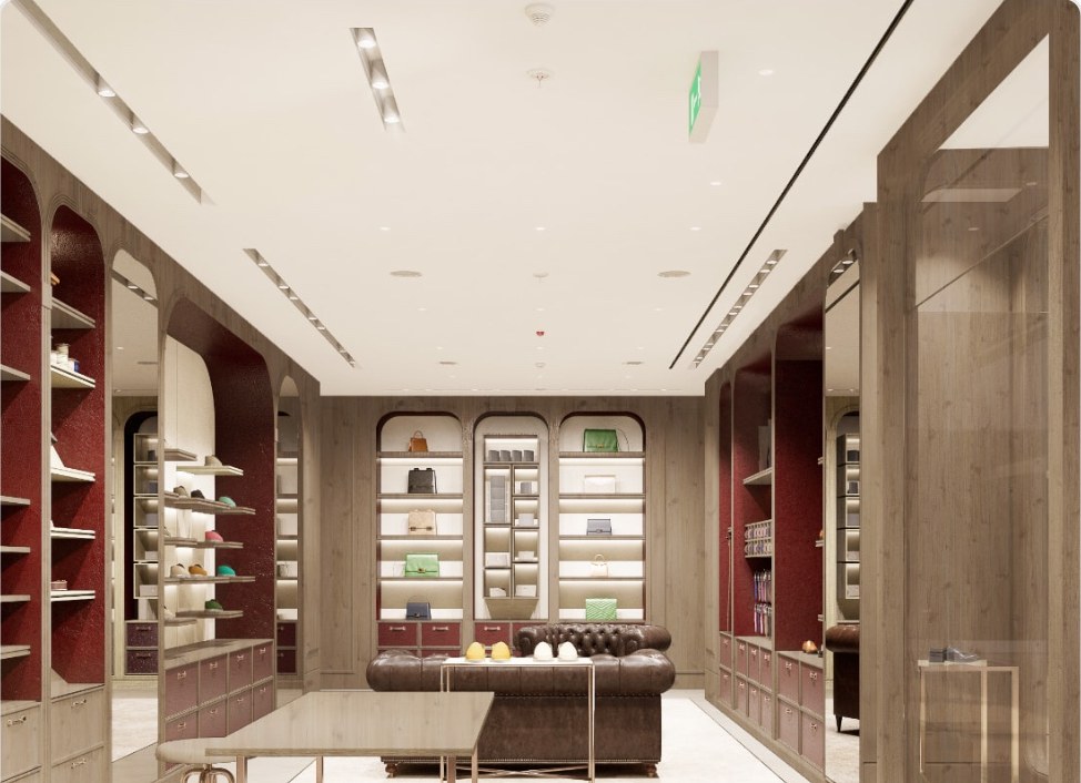 Lacquered burgundy display wall with brass detailing