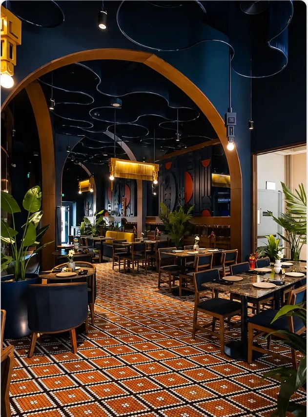 Dining floor with patterned tiling and bespoke banquettes