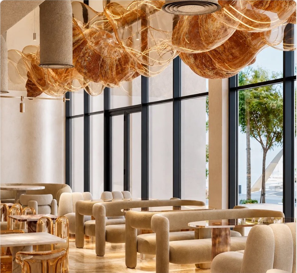 Suspended amber feature installation over the lounge seating
