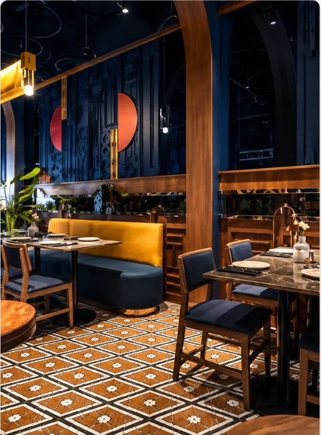 Loose seating and sculpted relief feature wall